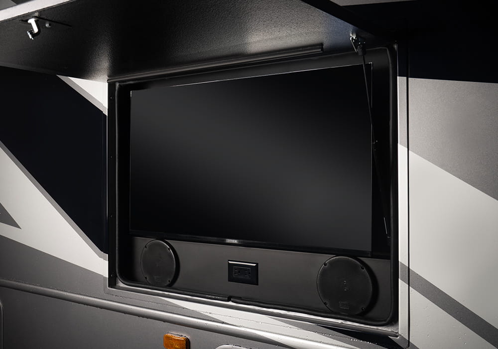Entegra Coach Vision exterior entertainment compartment with television