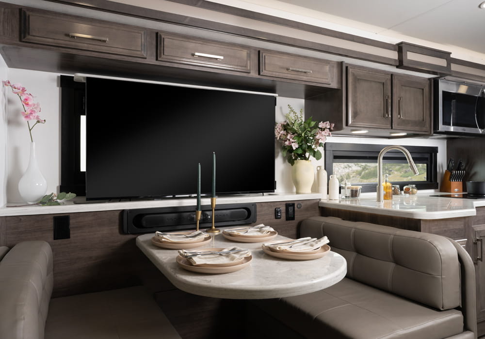 Entegra Coach Emblem dinette and entertainment area