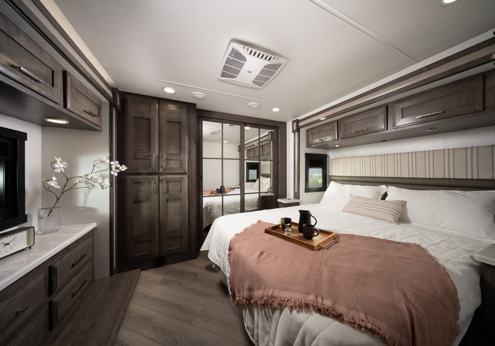 Entegra Coach Emblem bedroom with queen bed