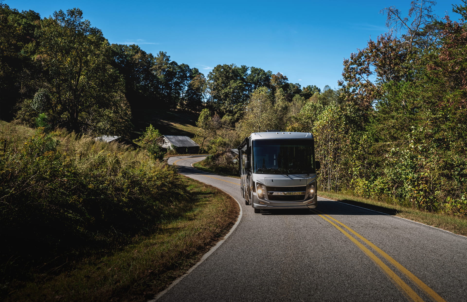 Entegra Coach Class A motorhome on desert road