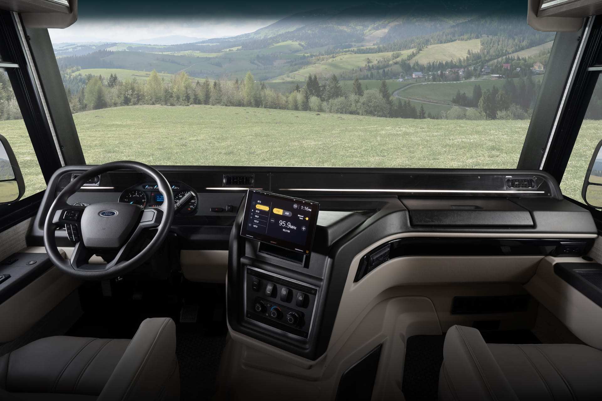 Entegra Coach Class A cockpit windshield view of mountains