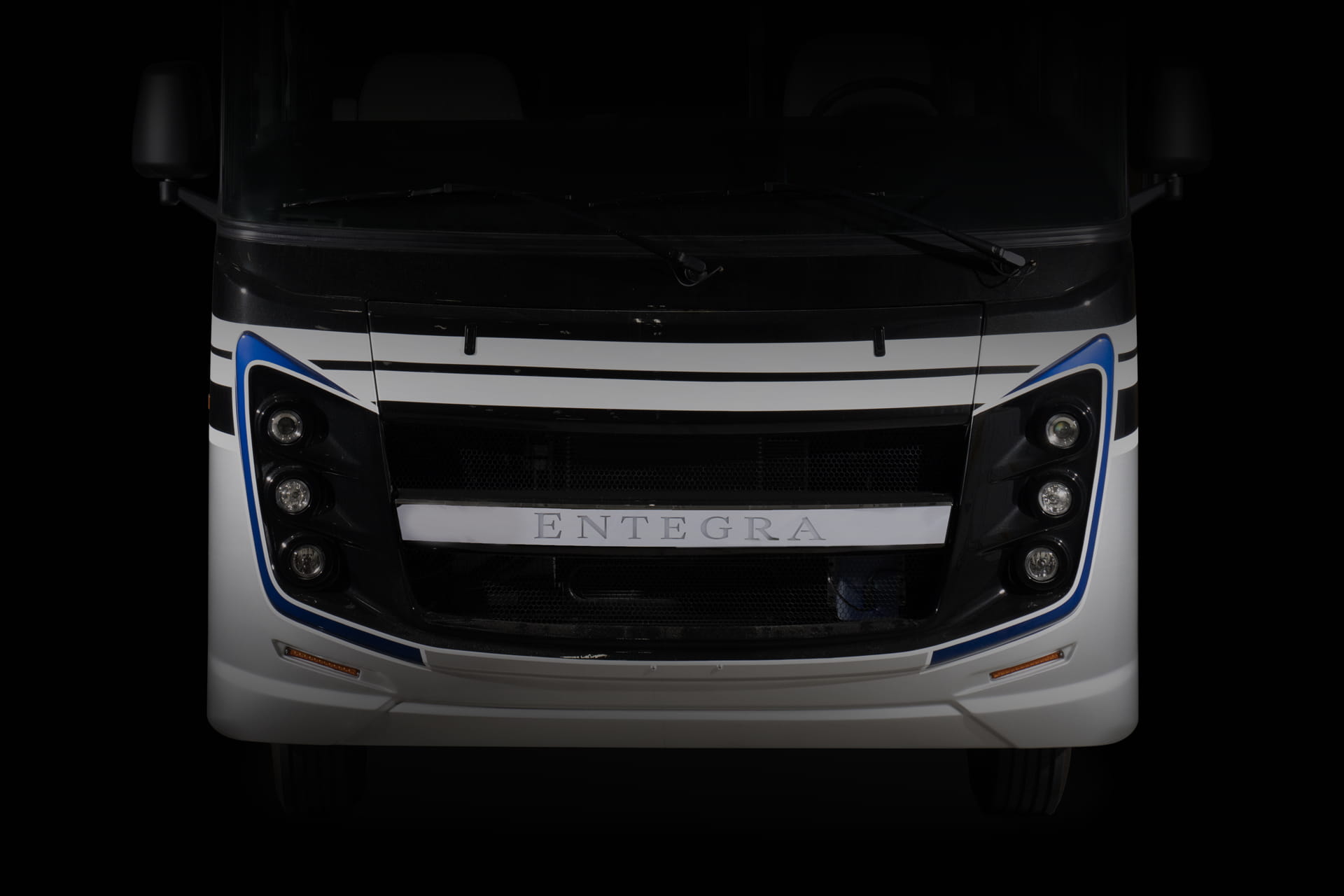 Entegra Coach Emblem front grille and headlight detail