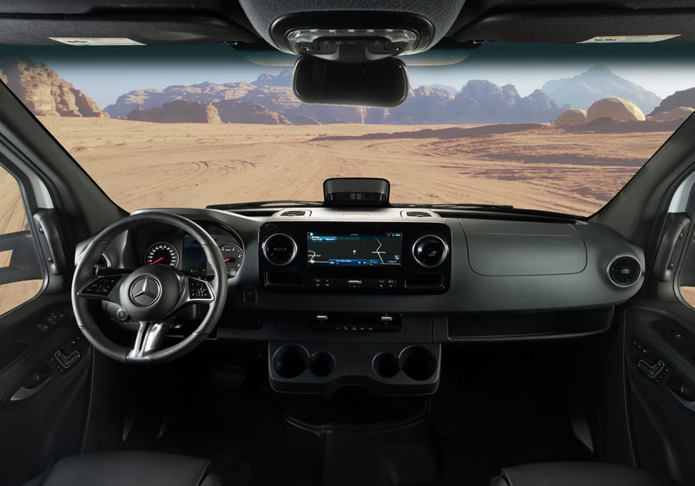 Entegra Coach Qwest cockpit dashboard with desert windshield view