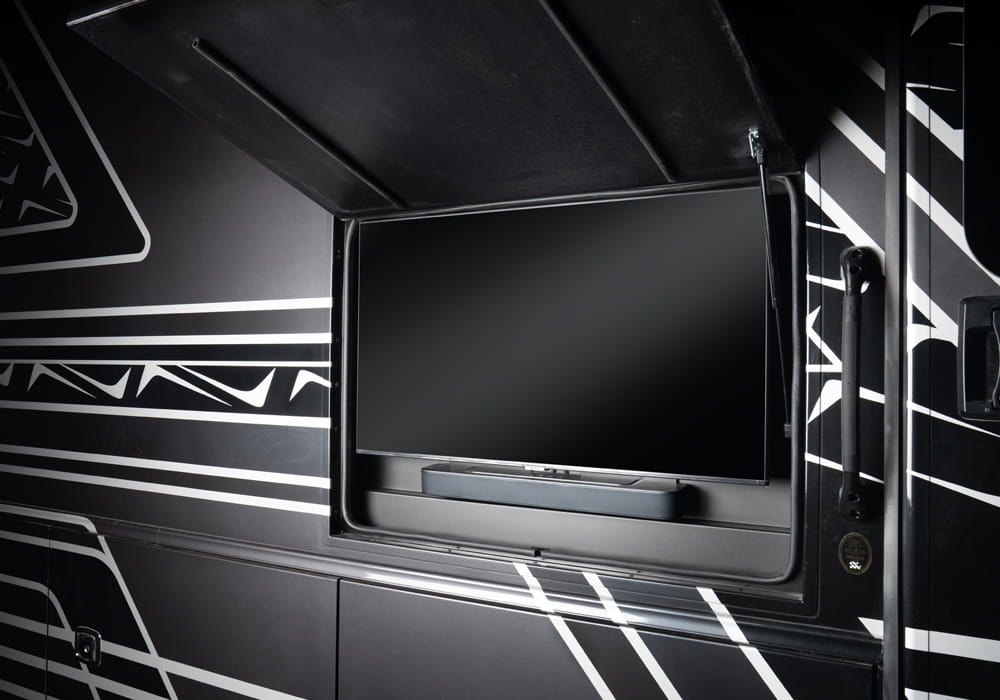 Entegra Coach Accolade XL exterior entertainment compartment with television