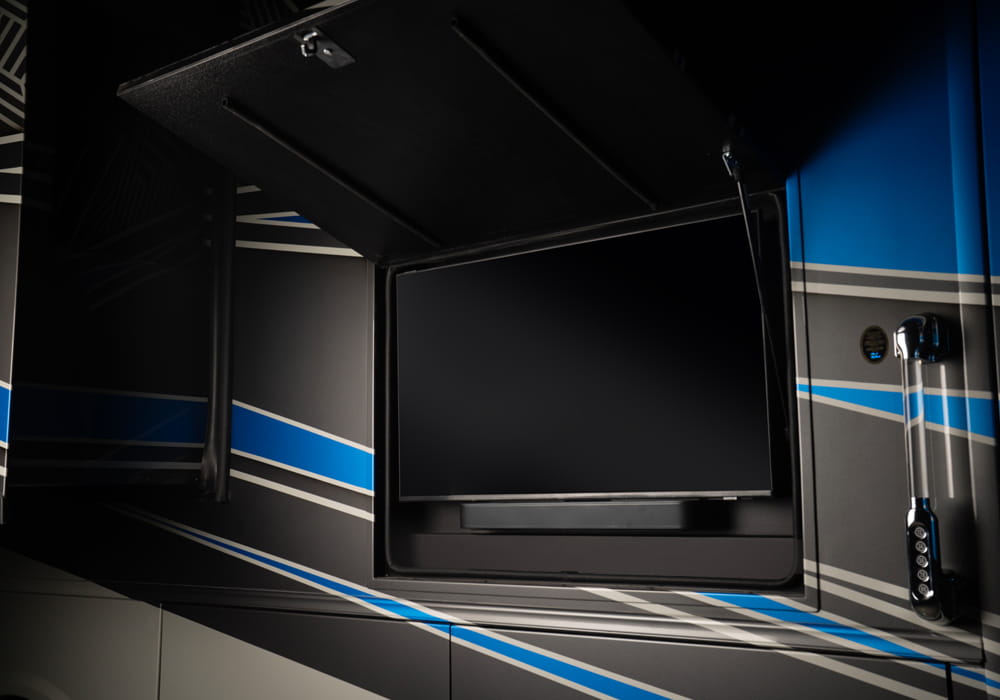 Entegra Coach Centurion exterior entertainment compartment with television