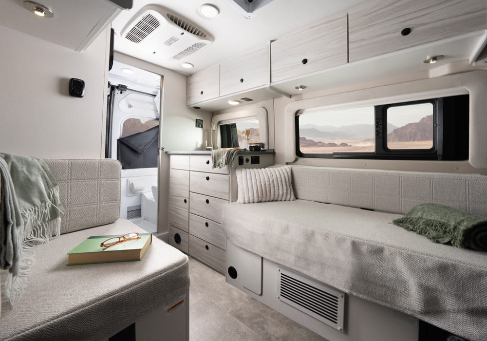 Entegra Coach Arc lounge seating with rear bed