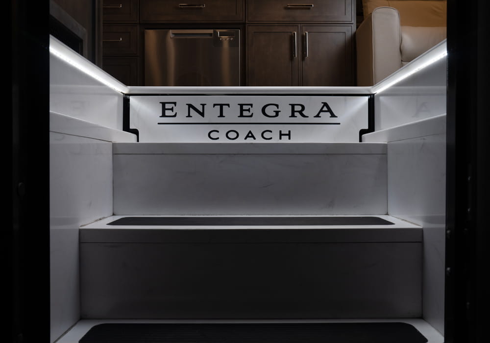 Entegra Coach Centurion entry door and steps with brand mat